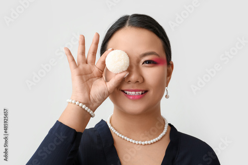 Beautiful Asian woman with ...
