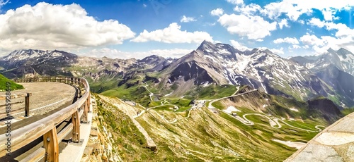 Mountain panorama. Austrian Alps. Euro-trip. Stone slopes. Snow-capped mountains. Ski resort. Rarefied clean air. Frosty spaces. Mountain view on a clear day.