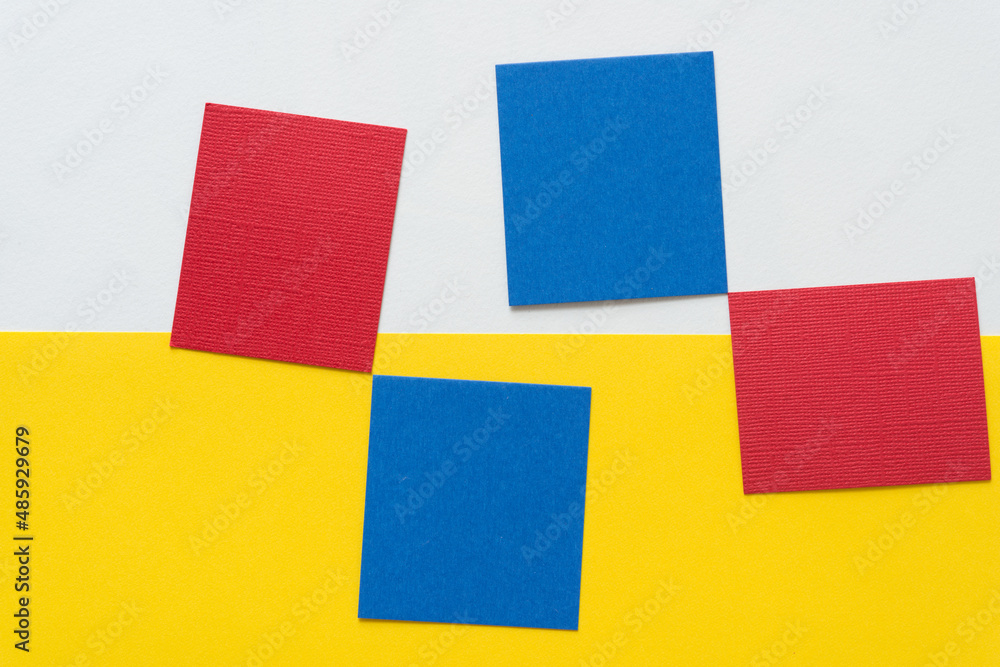 primary color squares on white and yellow