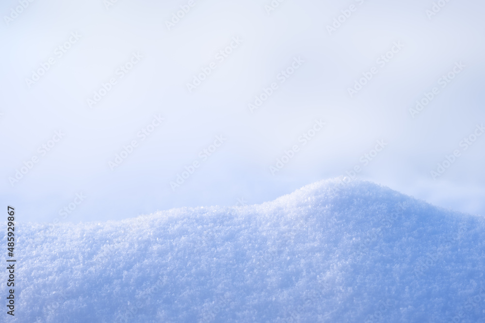 Natural podium from snow snowdrift for mockup display or presentation of products. Advertising theme concept. Blank winter and christmas background.