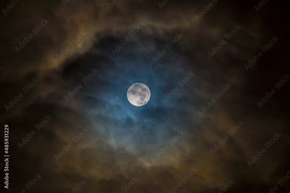 The eye in the sky:  Full moon surrounded by skies