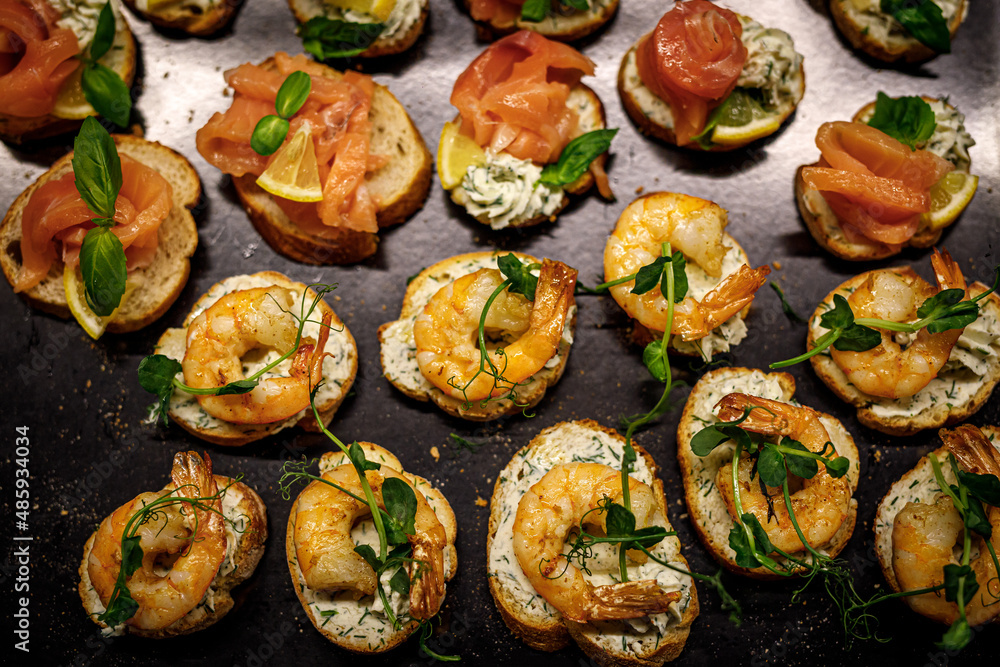 Selection of tasty bruschetta with salmon and shrimp. Selection of tasty bruschetta with salmon and shrimp.
