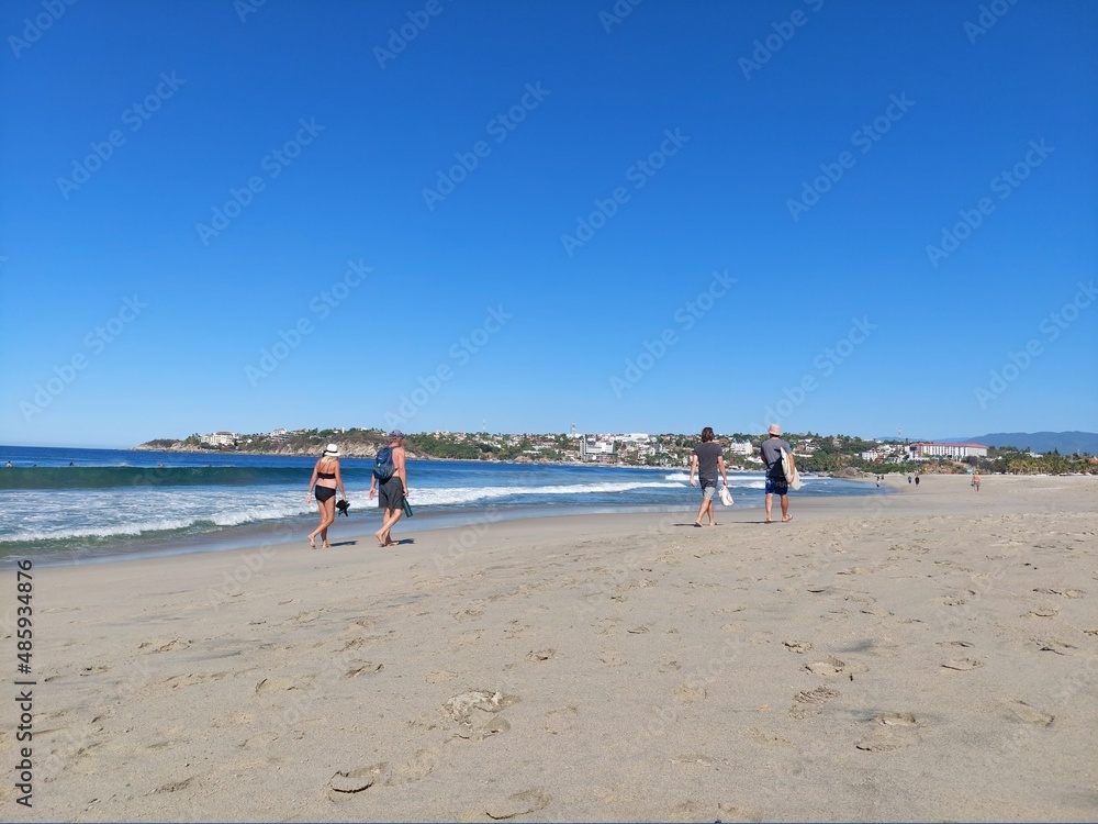 Beach walk in Playa Zicatela, Puerto Escondido, Mexico Beach walk in Playa Zicatela, Puerto Escondido, Mexico