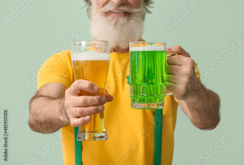 Senior man with glasses of ...