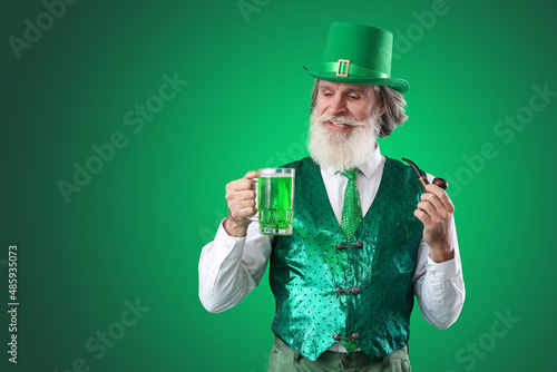Senior man with smoking pip...