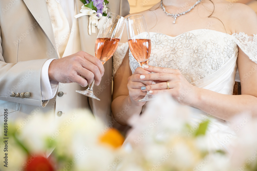 Where the bride and groom are stacking glasses Where the bride and groom are stacking glasses