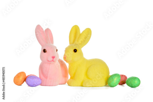 Cute Easter bunnies and eggs on white background