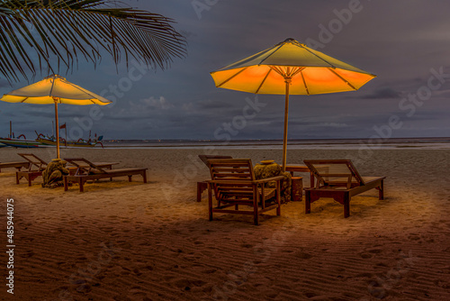 Sunbeds in evening light at Sanur Beach on the Island of Bali