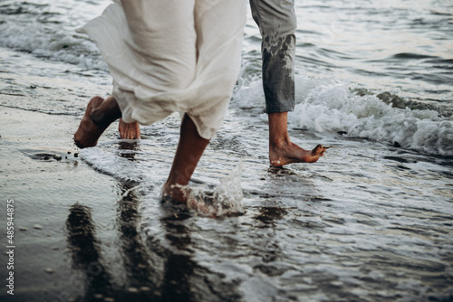 person on the beach legs love run sea ocean sand water