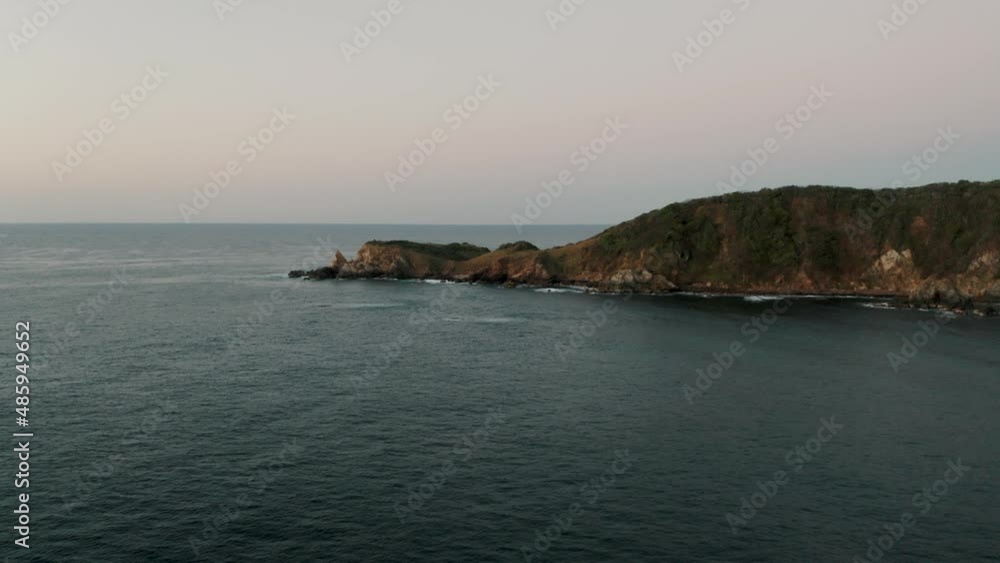 Flying over the beautiful rocky islands near Mazunte, Oaxaca at sunset.
Flying over the beautiful rocky islands near Mazunte, Oaxaca at sunset.