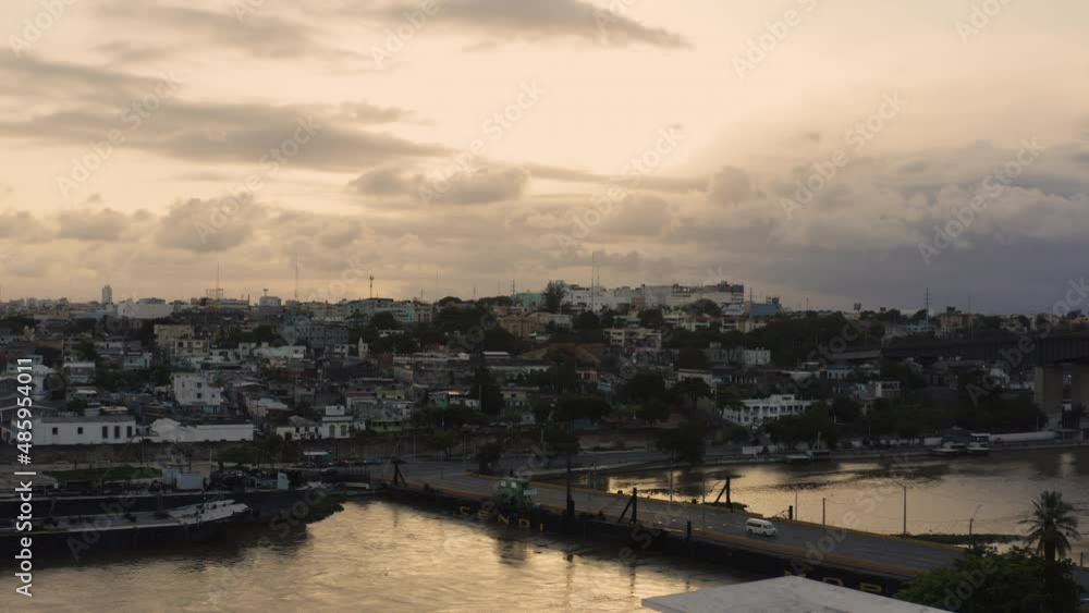 AERIAL - Bay, residential sector at sunrise, Santo Domingo, Dominican Republic, reverse AERIAL - Bay, residential sector at sunrise, Santo Domingo, Dominican Republic, reverse