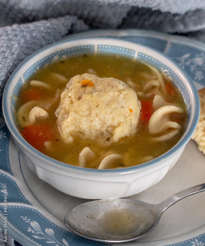 Matzo ball soup with chicken and noodles, like my grandma used to make