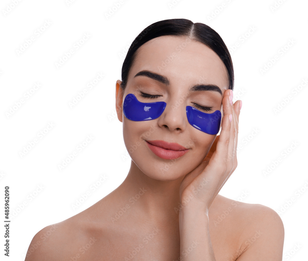 Beautiful young woman with under eye patches on white background Beautiful young woman with under eye patches on white background