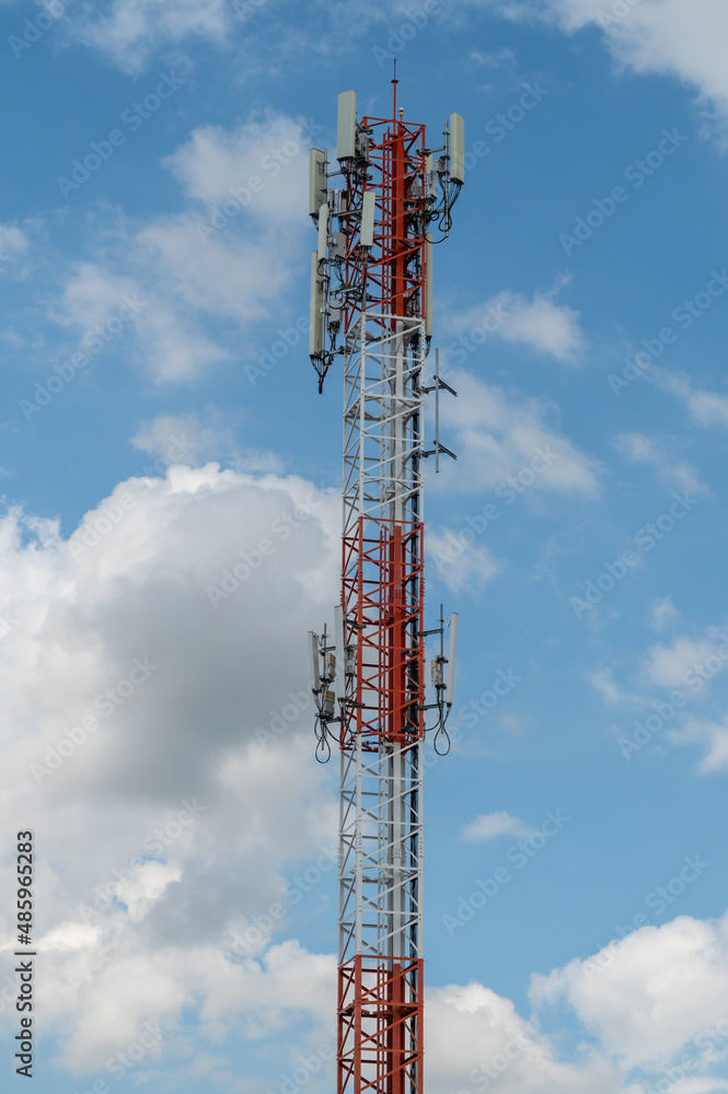 Antenna repeater tower on blue sky. Antenna repeater tower on blue sky.
