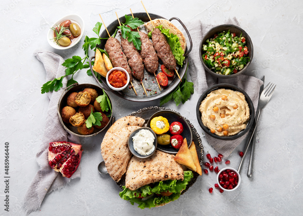 Lebanese food assortment on light background. Lebanese food assortment on light background.