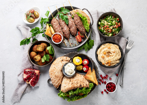 Lebanese food assortment on light background.