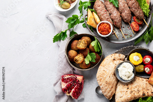 Lebanese food assortment on light background.