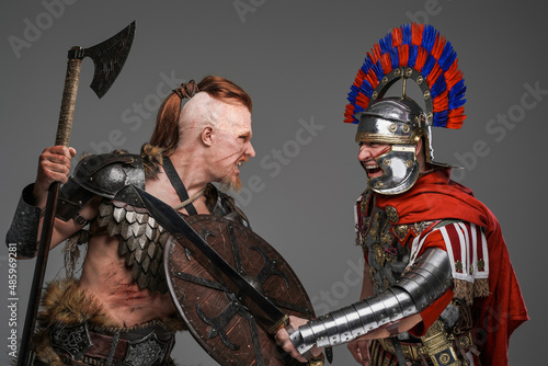 Obraz na plátně Violent fight of ancient viking and roman centurion