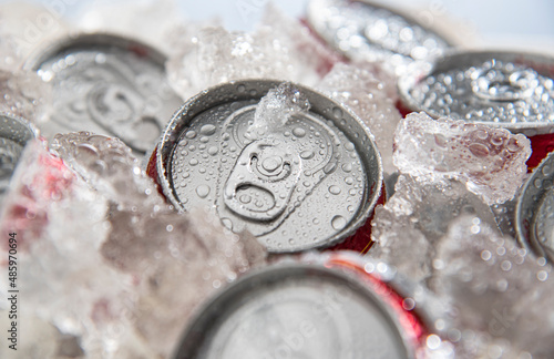 beer cans chilled in ice 