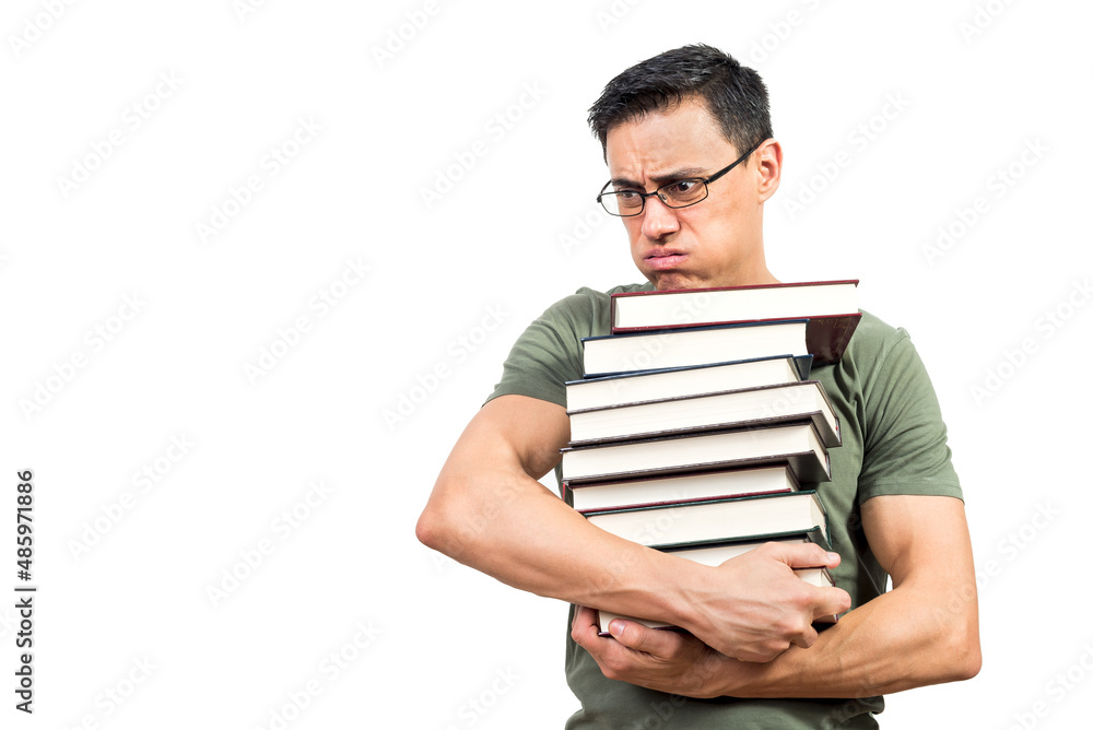 Tired male student carrying stack of books Tired male student carrying stack of books
