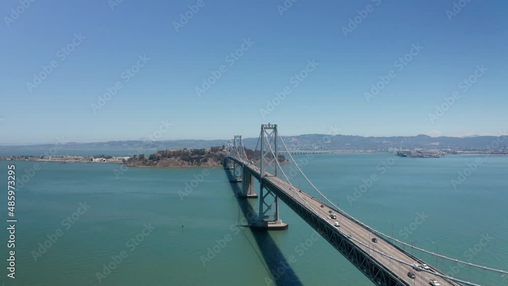 Aerial flyover shot looking down above the Bay Bridge on a clear day. 4K Aerial flyover shot looking down above the Bay Bridge on a clear day. 4K