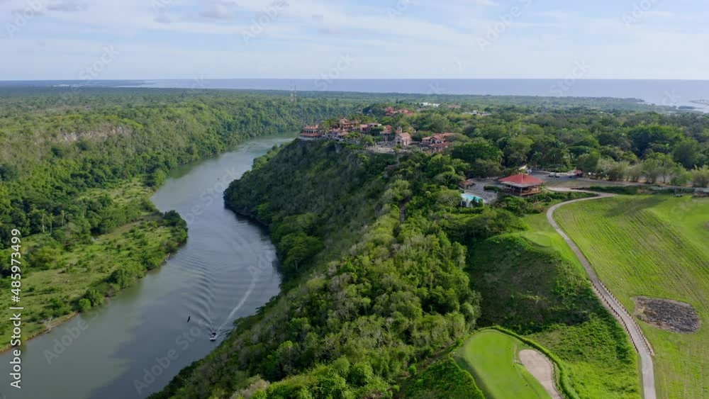 Beautiful aerial shot of the medieval town Altos de Chavon in Casa de Campo, la Romana, in the Dominican Republic, river chavon in view Beautiful aerial shot of the medieval town Altos de Chavon in Casa de Campo, la Romana, in the Dominican Republic, river chavon in view