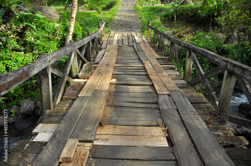 Fototapeta Naklejka Na Ścianę i Meble -  River bridge made of wood