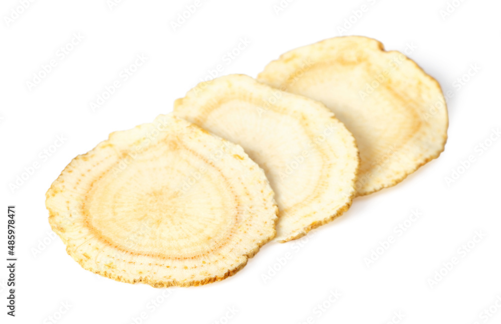 Close up of ginseng slices isolated on white background. Close up of ginseng slices isolated on white background.
