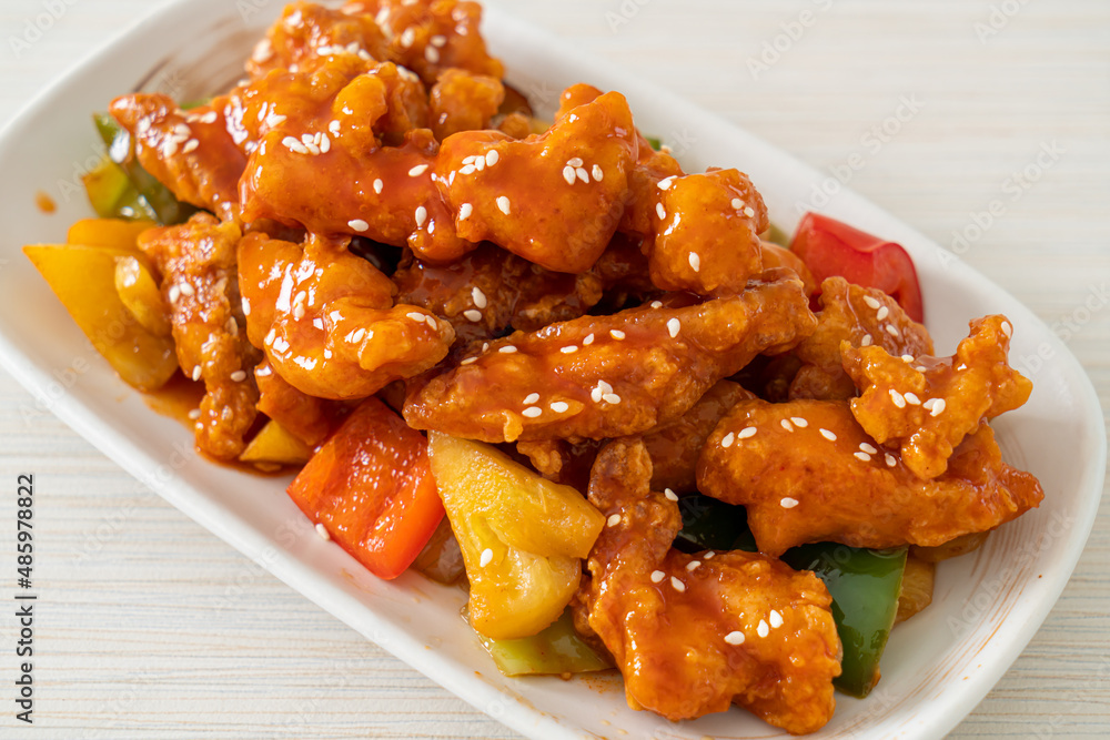 fried crispy chicken with sweet and sour sauce fried crispy chicken with sweet and sour sauce