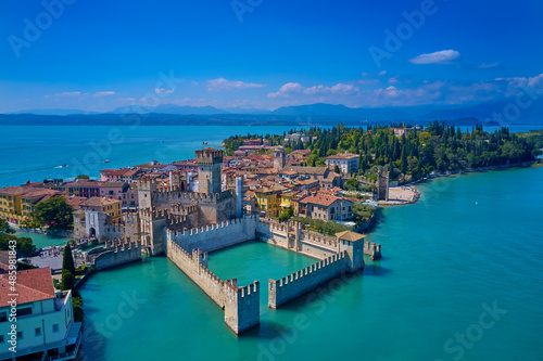 Italian castle on Lake Garda. Sirmione aerial view. Top view, historic center of the Sirmione peninsula, lake garda. Aerial panorama of Sirmione. Lake Garda, Sirmione, Italy. © Berg