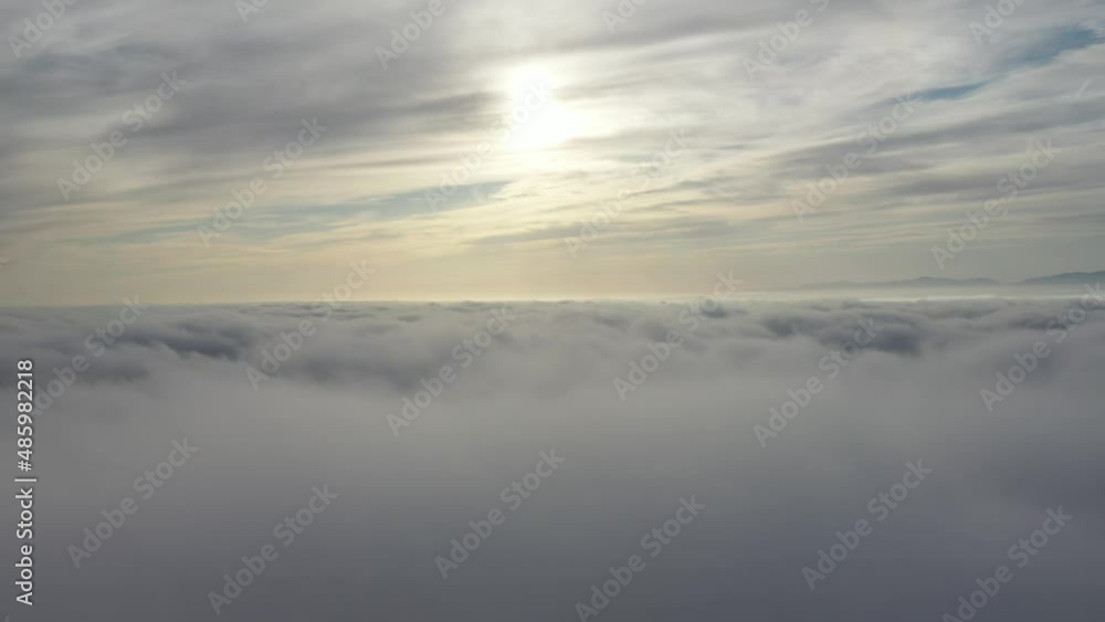 Layer Of White Clouds Against Dramatic Sunset Sky. Aerial Shot Layer Of White Clouds Against Dramatic Sunset Sky. Aerial Shot