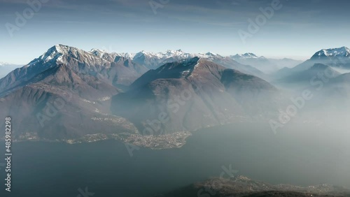 Wallpaper Mural Beautiful aerial landscape of Como Lake located between Alps in Italy, Europe. Clear sunny day with fog around mountains and Como Lake visible. Filmed with DJI Mavic 2 pro drone at 50fps. Torontodigital.ca