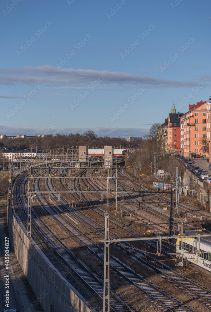 Train to Arlanda airport passing the rail tracks on its way to central station a winter day in Stockholm Train to Arlanda airport passing the rail tracks on its way to central station a winter day in Stockholm