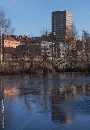 Panorama with bridge view over the canal Karlbergskanalen, apartment and office houses by the train tracks and the traffic route Karlbergsleden a winter day in Stockholm © Hans Baath