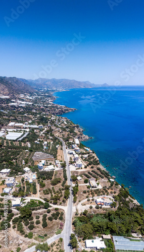 View of coastal city with mountain range