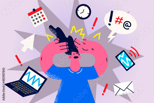 Stressed businesswoman overwhelmed with work tasks 