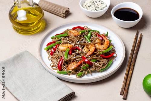 Soba noodles with shrimp  pepper and green beans. Japanese cuisine. Asian food.