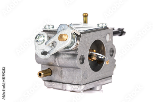 close-up carburetor for a chainsaw on a white isolated background