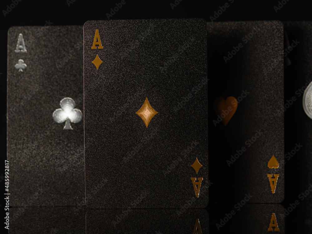 Obraz premium 3D image. Poker black cards, three aces on a black background. Casino, nightclub, gambling, poker, gambling business, game strategy. Advertising, banner. There are no people in the photo.