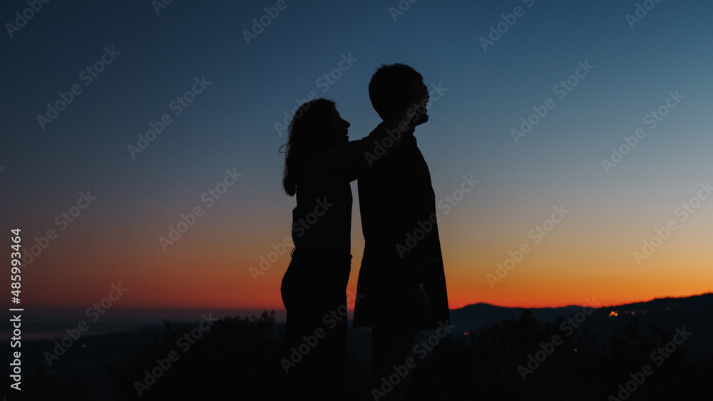 Silhouette of boy and girl surprise each other for Valentine's Day