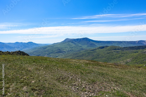 View of the Chatyr-Dag plateau from the top of the Demerdzhi mountain range in Crimea. Russia.