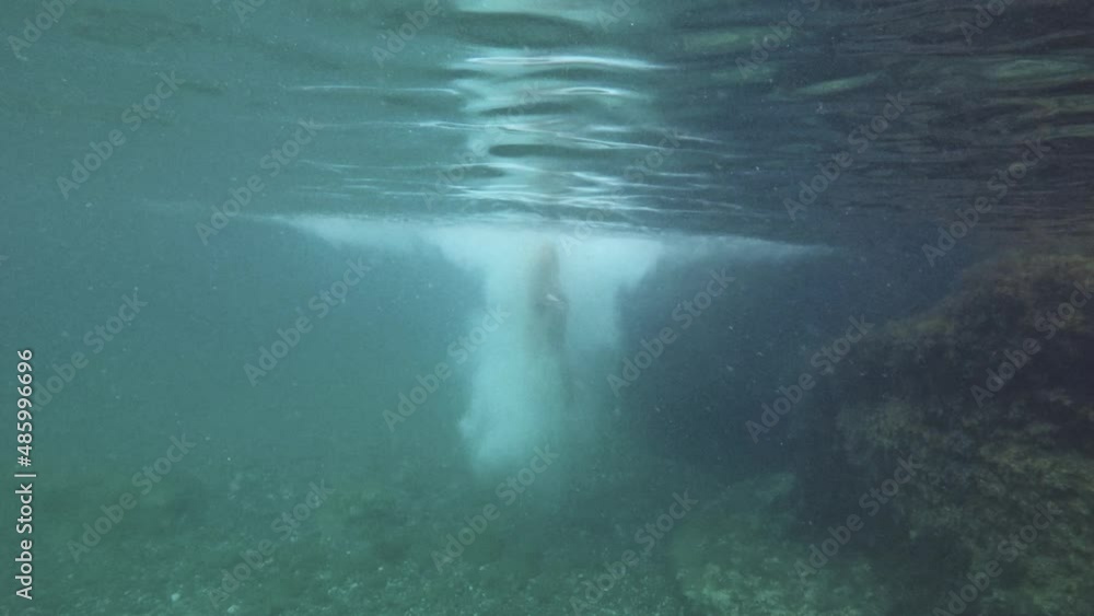Wideo Stock Boy Having Fun Jumping in the Water Park With Water Slides