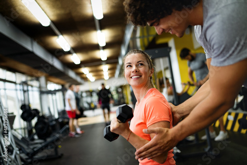 Portrait of happy fit women working out is gym to stay healthy. Sport people concept