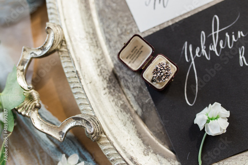 rings on a silver plate