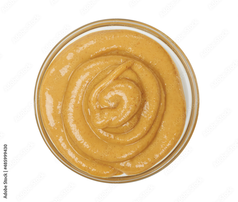 mustard sauce in a bowl isolated on white background mustard sauce in a bowl isolated on white background