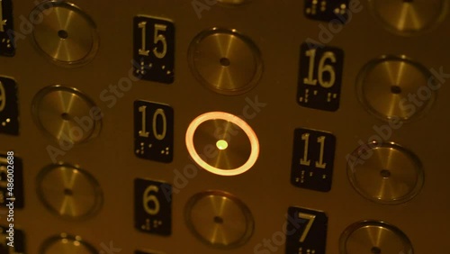 Pressing button in elevator in 4k slow motion 60fps