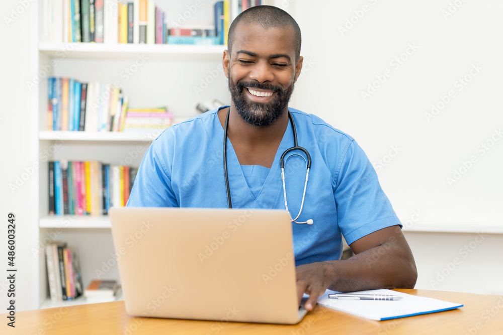 Video call of african american doctor with patient at computer Video call of african american doctor with patient at computer