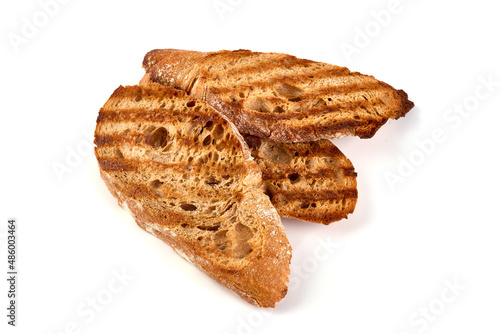 Crostini, crispy toasted bread, isolated on white background.