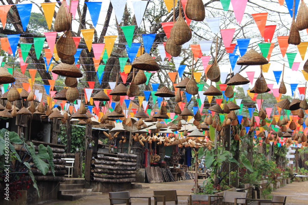 Naklejka premium Decorated items made of color paper and bamboo utensils in various forms.