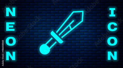 Glowing neon Medieval sword icon isolated on brick wall background. Medieval weapon. Vector